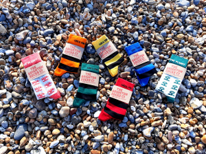 Socks displayed on pebbles